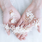 C129. clay florals boho bridal white hair comb and earrings.